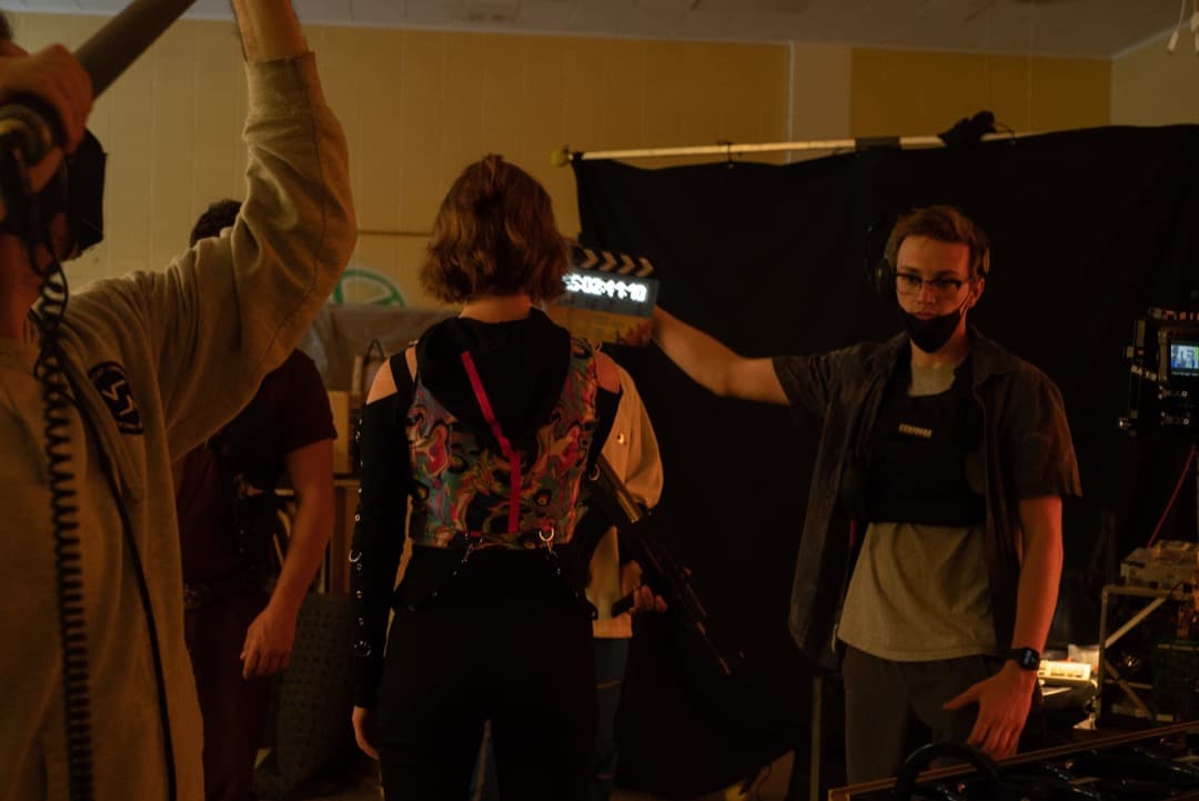 Behind the scenes photo 11 from Clone Cops production showing 2nd ac david king slating a scene